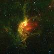 Esta imagen de la nebulosa NGC 7380, tambi&eacute;n conocida como la Nebulosa del Mago, es un mosaico de im&aacute;genes captadas por el telescopio espacial WISE en infrarrojo