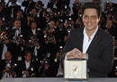 Actor Benicio Del Toro poses with the Best Actor award for the film 