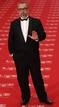 Spanish director de la Iglesia poses on the red carpet before the Spanish Film Academys Goya awards ceremony in Madrid