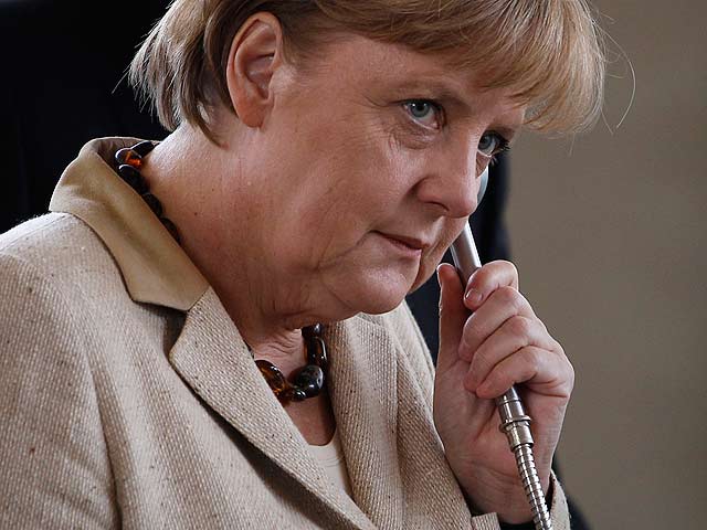 Sarkozy y Merkel apoyan el futuro de Grecia en el euro por su "determinaci&oacute;n" en las reformas