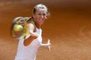 Azarenka devuelve la pelota a Szavay.