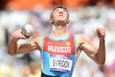 El atleta ruso Sergey Sviridov compite en tiro en la ronda de clasificaci&oacute;n masculina en el evento de atletismo de los Juegos.