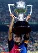 BARCELONAS CAPTAIN JOSEP GUARDIOLA RAISES THE TROPHY.
