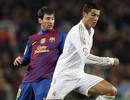 Barcelonas Messi and Real Madrids Cristiano Ronaldo challenge during their Spanish Kings Cup quarter-final soccer match in Barcelona
