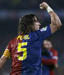 Barcelonas Puyol celebrates Etoos goal against Real Madrid during Spanish First Division soccer match in Barcelona