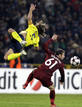 Barcelonas Puyol challenges Rubin Kazans Karadeniz during their Champions League soccer match at the Central stadium in Kazan