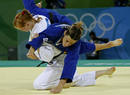 Boehm of Germany fights with Iglesias of Spain during their womens -70kg preliminary judo match at the Beijing 2008 Olympic Games