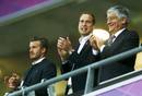 Britains Prince William, soccer ace David Beckham (L) and with Britains Sports Minister Hugh Robertson watch the mens preliminary first round Group A soccer match between Britain and UAE at the London 2012 Olympic Games in the Wembley Stadium in L