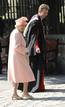 Britains Queen Elizabeth arrives for the marriage of her eldest granddaughter Zara Phillips in Edinburgh