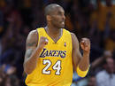 El jugador de los &Aacute;ngeles Lakers, Kobe Bryant, se alegra por una canasta ante los Orlando Magic en el primer partido de la NBA.