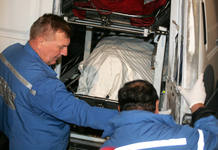Medics push a stretcher with the body of Russian journalist Politkovskaya into an ambulance after she was found dead in central Moscow Medics push a stretcher with the body of Russian journalist Politkovskaya into an ambulance after she was found dead in central Moscow