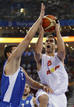 Calderon of Spain goes for basket against Tsartsaris of Greece during B mens basketball game at Beijing 2008 Olympic Games