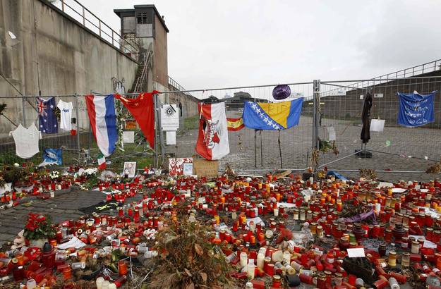 Candles and flowers are seen in Duisburg Candles and flowers are seen in Duisburg