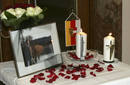 Velas y foto de Haider