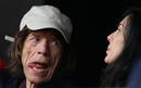 El cantante brit&aacute;nico Mick Jagger y la dise&ntilde;adora estadounidense LWren Scott asisten como aficionados a una de las pruebas de atletismo de los Juegos de Londres 2012.