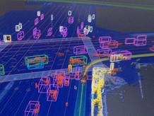 Esto es lo que ve el coche de Google con sus sensores, un mundo compuesto de bloques en movimiento.
