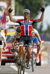 Cervelo rider Thor Hushovd of Norway celebrates as he crosses the finish line to win the third stage of the Tour de France cycling race between Wanze and Arenberg-Porte Du Hainaut,