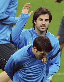 Cesc Fábregas (i) y David Villa, durante un entrenamiento con su equipo, el FC Barcelona. Cesc Fábregas (i) y David Villa, durante un entrenamiento con su equipo, el FC Barcelona.