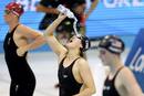Chinas Fu Yuanhui pours water on her head before their womens 100m backstroke semi-final during the London 2012 Olympic Games