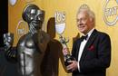 Christopher Plummer ense&ntilde;a su galard&oacute;n como mejor actor secundario en la pel&iacute;cula 