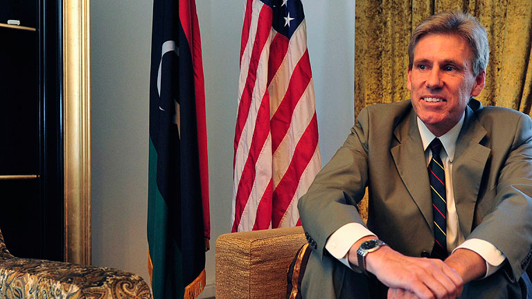 Christopher Stevens, the U.S. ambassador to Libya, smiles at his home in Tripoli