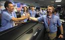 Mars Science Laboratory Flight Director Comeaux celebrates with Greco after the Mars science rover Curiositys successful landing, at Jet Propulsion Laboratory in Pasadena