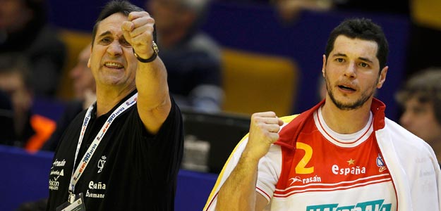 Coach Rivera and Entrerrios of Spain celebrate a goal against France during their men's European Handball Championship Group C match in Novi Sad