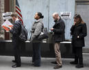 Voters wait in line to vote in New Yorks lower Manhattan