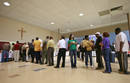Residents line up to vote in national election at church in New Orleans