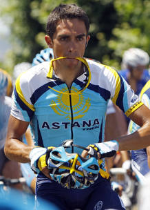 Astana rider Contador of Spain adjusts his helmet as he cycles during the third stage of the 96th Tour de France cycling race