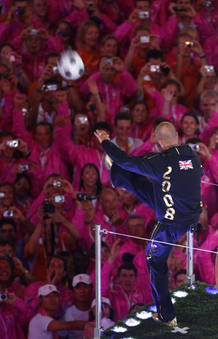 Soccer player David Beckham kicks a soccer ball during the closing ceremony of the Beijing 2008 Olympic Games at the National Stadium Soccer player David Beckham kicks a soccer ball during the closing ceremony of the Beijing 2008 Olympic Games at the National Stadium