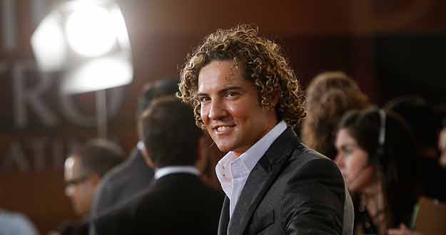 Spanish pop singer David Bisbal poses on the red carpet at the Premio Lo Nuestro Latin music awards show in Miami Spanish pop singer David Bisbal poses on the red carpet at the Premio Lo Nuestro Latin music awards show in Miami