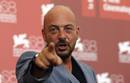 Director Emanuele Crialese points as he poses during a photocall for his film 
