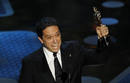 Director Lee Unkrich accepts the Oscar for best animated feature film for 
