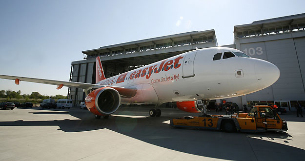 A new EasyJet Airbus A319 is moved out of hall following a ceremony at the Airbus delivery facility in Finkenwerder near Hamburg