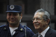 Former Guatemalan dictator Rios Montt smiles during a break at the Supreme Court of Justice in Guatemala City