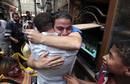 An Egyptian celebrates after a court sentenced deposed Egyptian president Hosni Mubarak to life in prison at Tahrir Square in Cairo