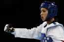 La taekwondista espa&ntilde;ola Briguitte Yag&uuml;e celebra uno de sus puntos en la ronda preliminar de la categor&iacute;a de -48 kilos en su combate contra la paname&ntilde;a Carolena Carstens