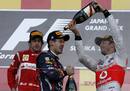 El podio del GP de Jap&oacute;n con Fernando Alonso, segundo, Vettel, tercero y campe&oacute;n del mundo, y Button, vencedor de la carrera