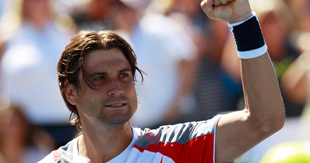 Ferrer of Spain celebrates after defeating Anderson of South Africa in their men's singles match at the U.S. Open tennis tournament in New York