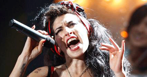 File photo of British singer Amy Winehouse performing at the Brit Awards at Earls Court in London