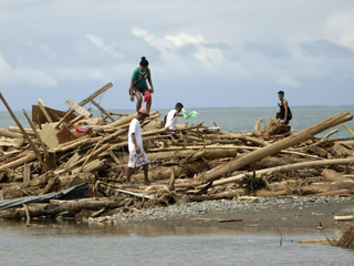 En Filipinas se elevan ya a m�s de mil el n�mero de muertos por las inundaciones