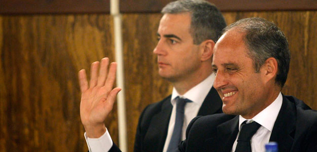 Former regional president and People's Party (Partido Popular) regional president Camps reacts beside the party's former regional Secretary General Costa as they listen to their sentence at the Valencia Superior Court in Valencia Former regional president and People's Party (Partido Popular) regional president Camps reacts beside the party's former regional Secretary General Costa as they listen to their sentence at the Valencia Superior Court in Valencia