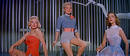 Fotograma de Marilyn Monroe, Betty Grable y Lauren Bacall en el trailer de la pel&iacute;cula C&oacute;mo casarse con un millonario, 1953.