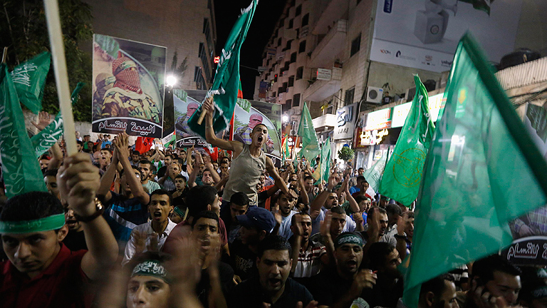 Los gazatíes celebran el alto al fuego pero no olvidan sus muertos, heridos y desplazados