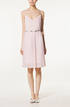 Vestido plisado en rosa palo con detalle de lazo dorado. Es de Massimo Dutti. 39,95&euro;