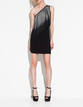 Vestido asim&eacute;trico de flecos de Zara. 22,99&euro;