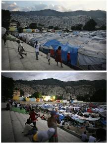 Un grupo de haitianos camina alrededor de un campamento improvisado en Puerto Pr&iacute;ncipe.