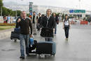 Passengers leave Beirut’s international airport on foot