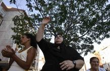 Gypsies attend an evangelical service outside the Evangelic Church of la Uncion in Seville